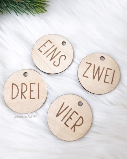 Runde Adventszahlen 1-4 aus Birkenholz gelasert