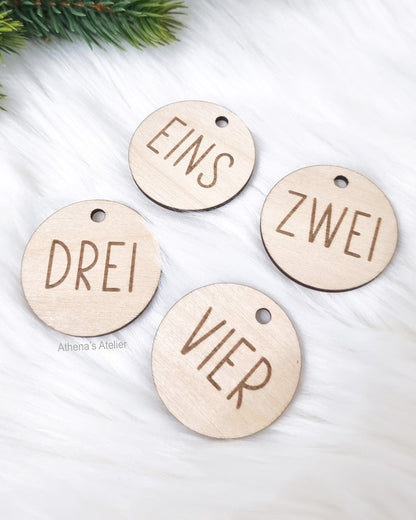 Runde Adventszahlen 1-4 aus Birkenholz gelasert