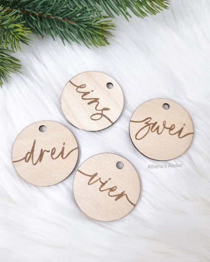 Runde Adventszahlen 1-4 aus Birkenholz gelasert 
