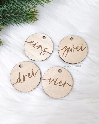Runde Adventszahlen 1-4 aus Birkenholz gelasert 